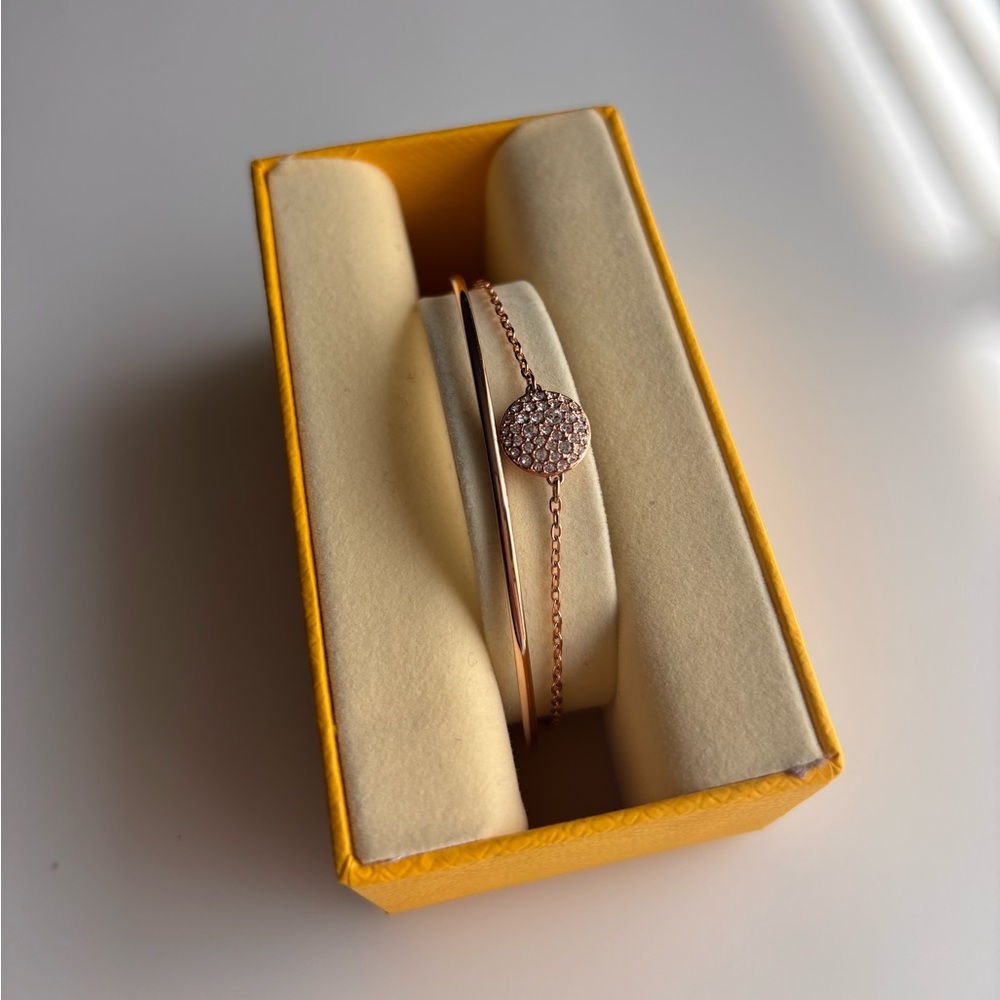 Swarovski Sublima Rose Gold Bangle with clear round crystals.